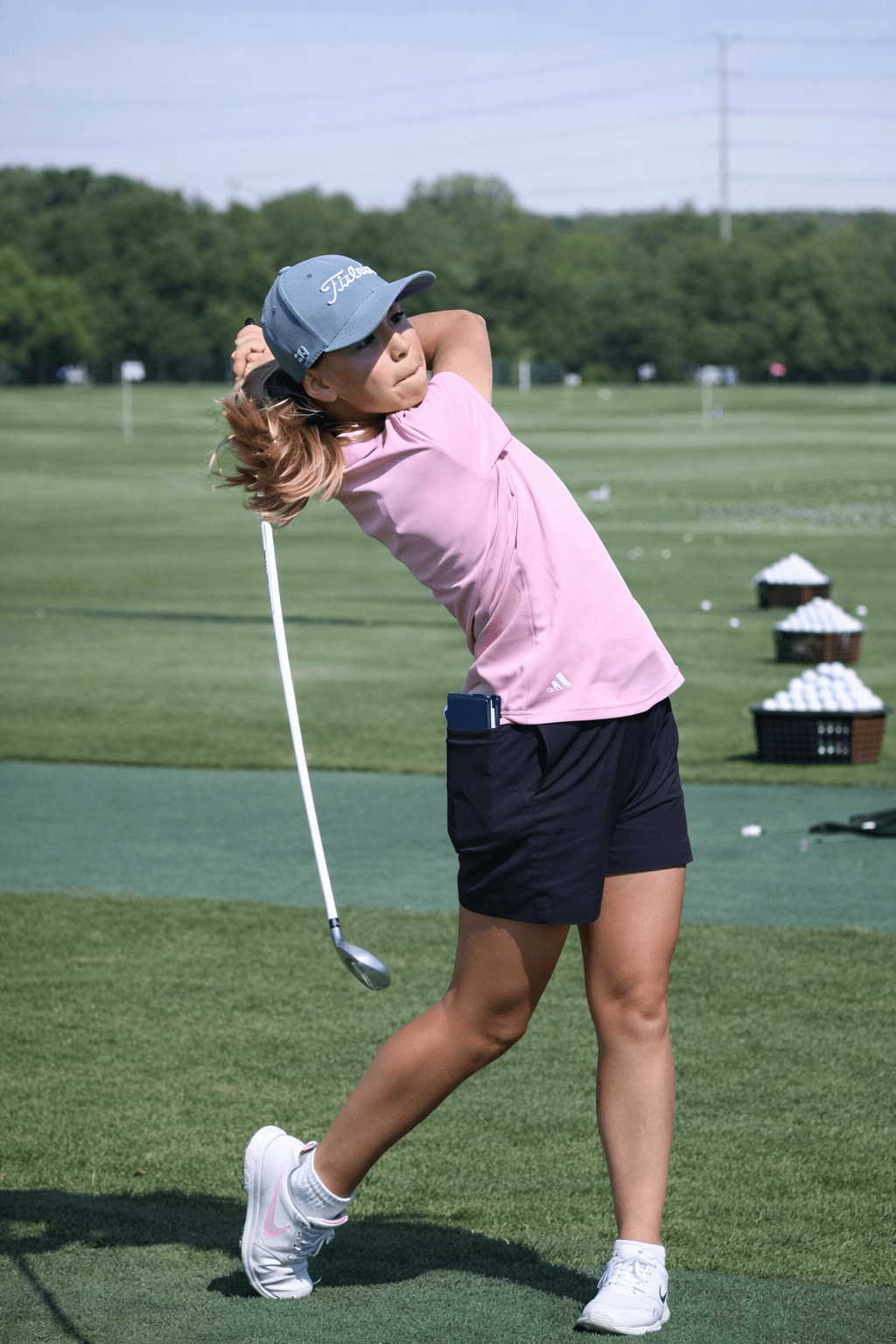 Sarah Gratté termine son swing au practice